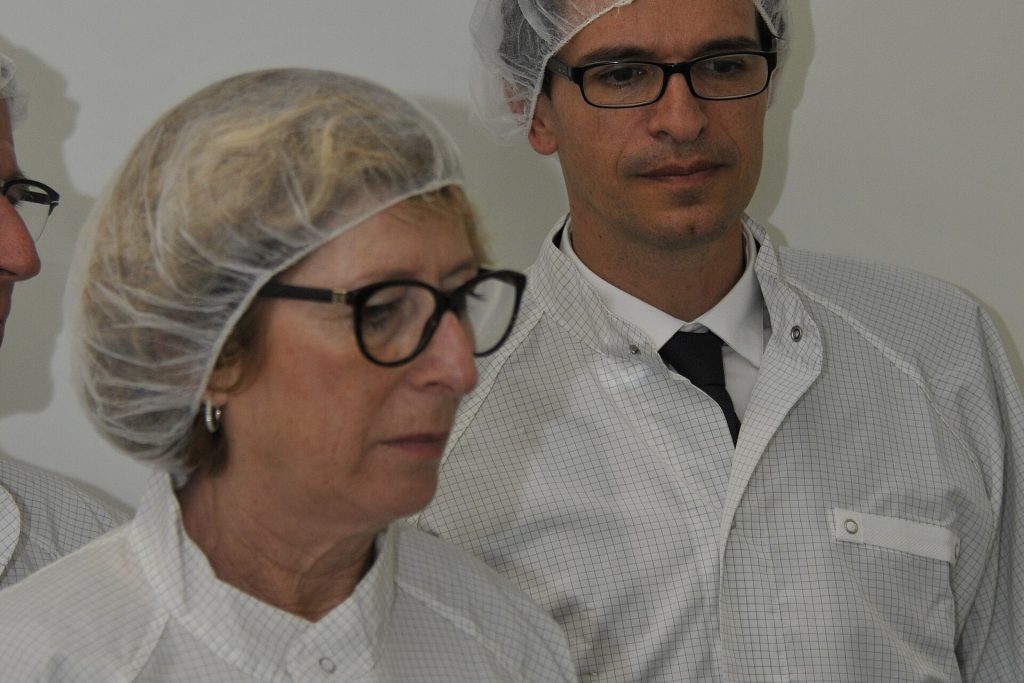 Semiconductor wafer being inspected inside a chip factory clean room